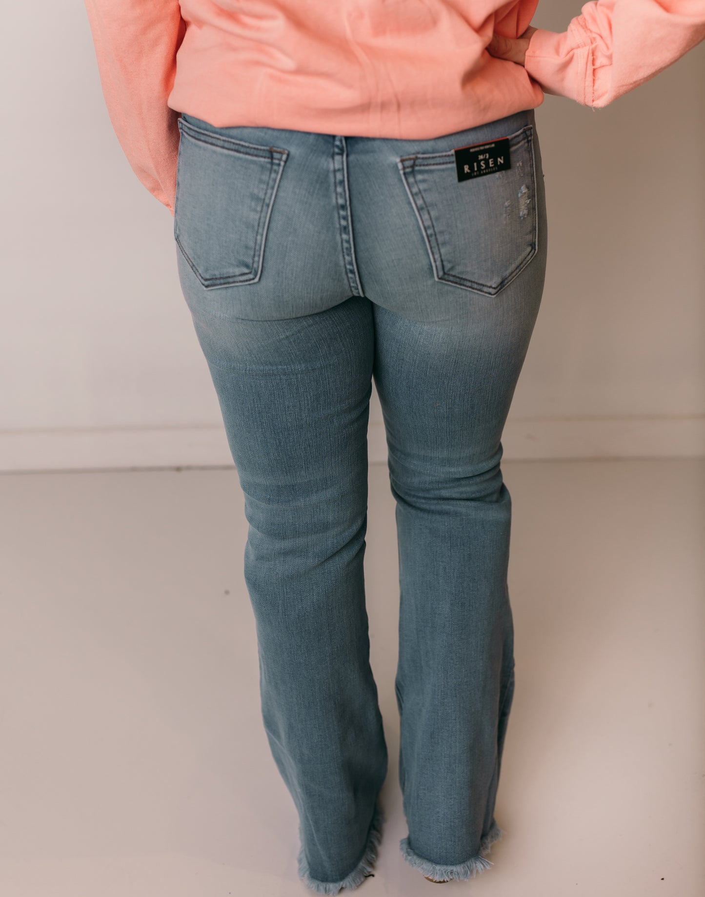Mae Light Wash Flares with Distressed Hem, Risen